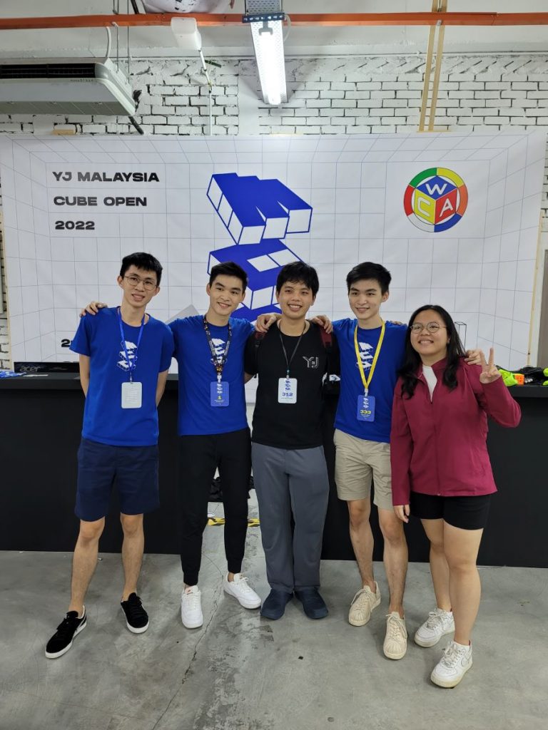 The Siew brothers in blue (left to right_ Eason, Manfred and Darren) flanked by two members of the organising committee (Custom)
